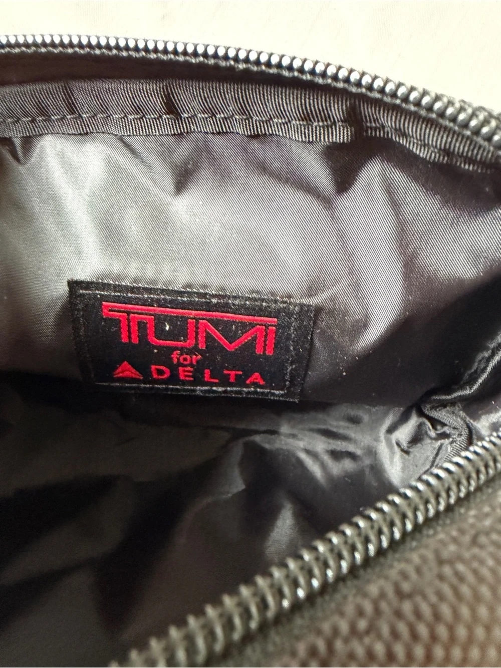 TUMI Toiletry Bag pouch with Socks eye Mask Delta Air Lines Amenity Kit nWOT